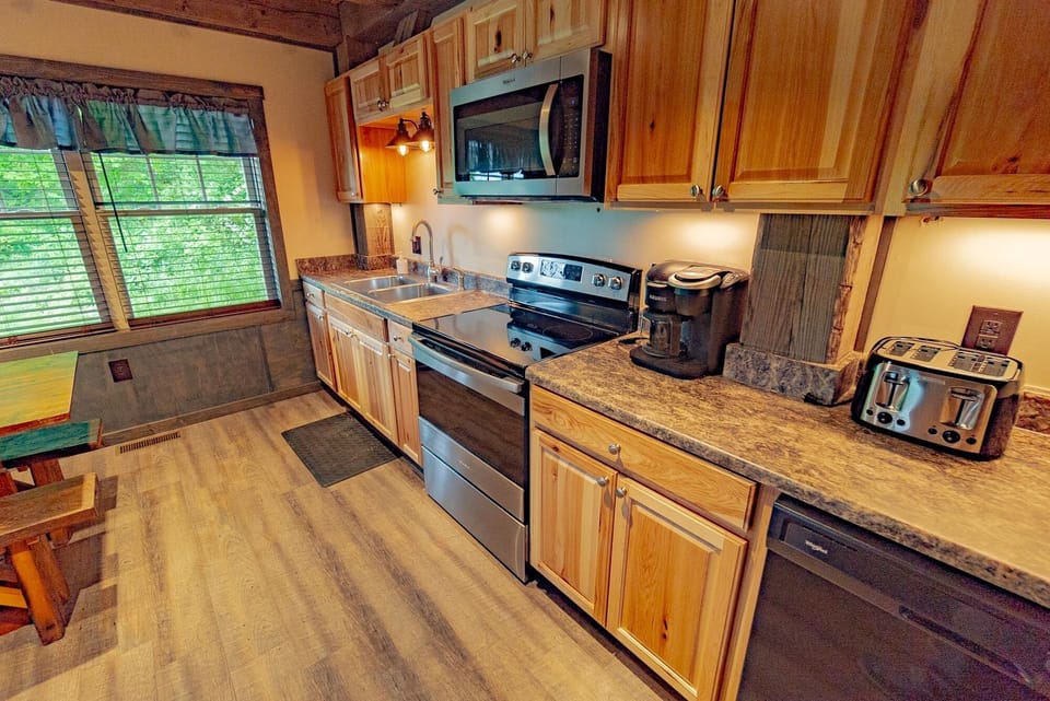 Kitchen - Main Level. Modern and elegant stocked kitchen. Great for preparing dinner.