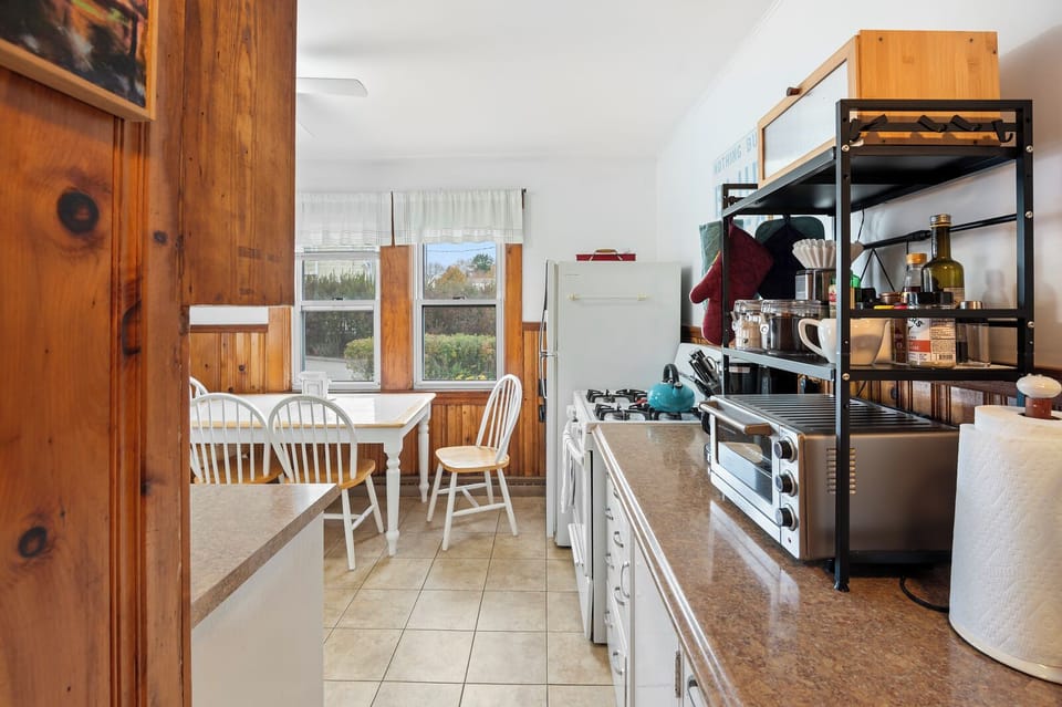 A fully equipped kitchen and dining space