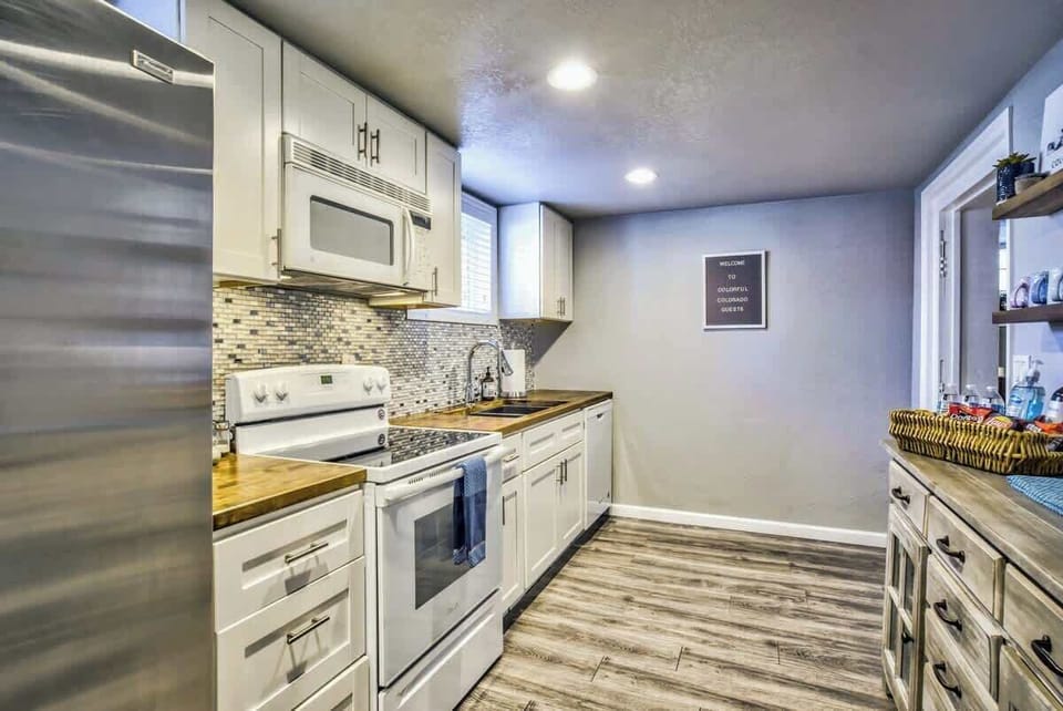 As you enter your private Olympic Basement, you come into the beautiful kitchen.