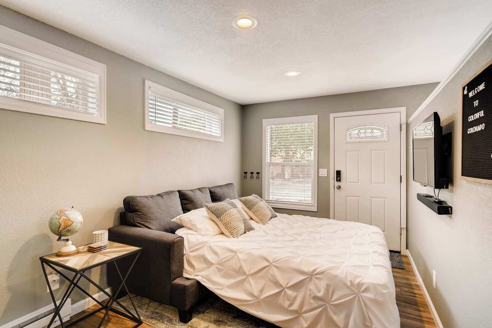The pull-out sofa transforms into a comfortable bed, providing extra sleeping space while maintaining a cozy and inviting atmosphere.





