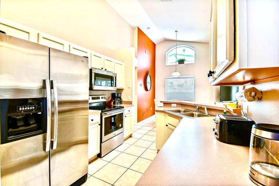 Fully fitted kitchen with large fridge/freezer