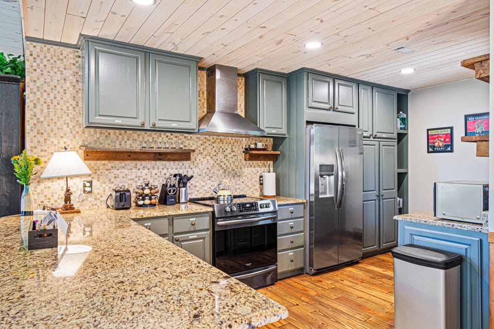 Kitchen has brand-new appliances and granite countertops.
