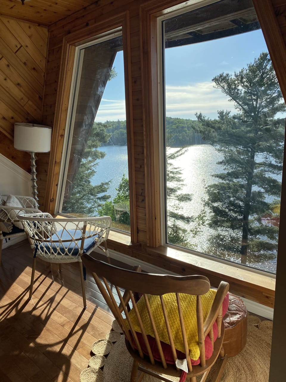 Come relax by the big bay windows overlooking the lake