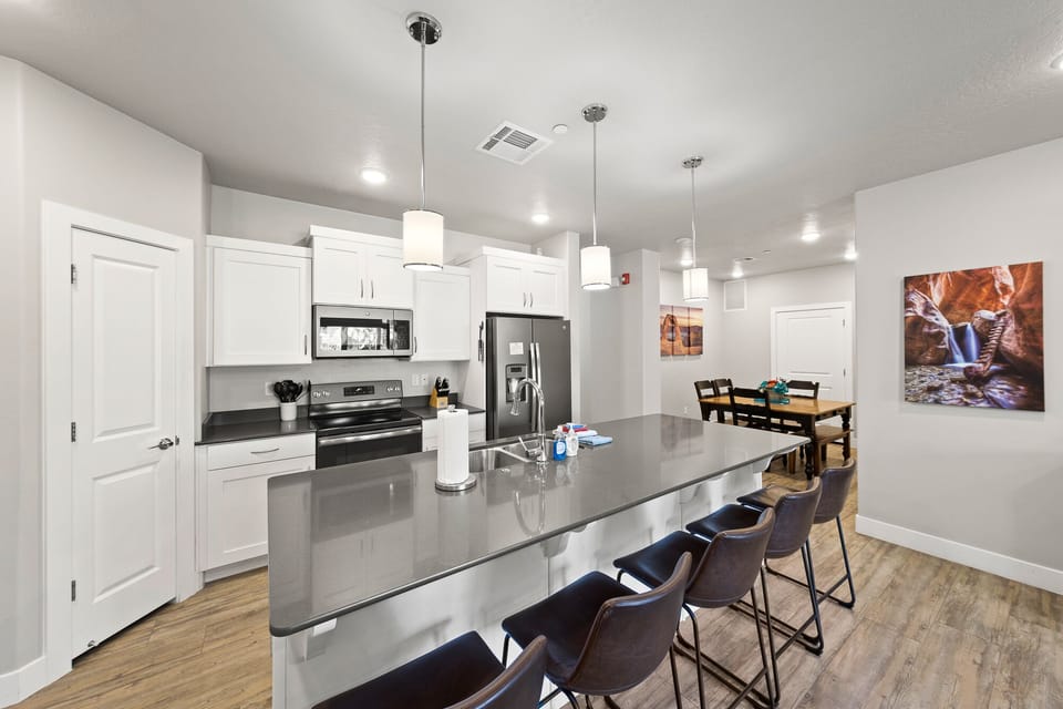 Isn't this an awesome kitchen? Pantry on your left and bar on your right