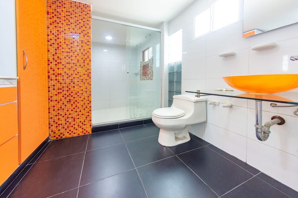 Standard Quadruple Room | Bathroom | Shower, designer toiletries, towels, soap
