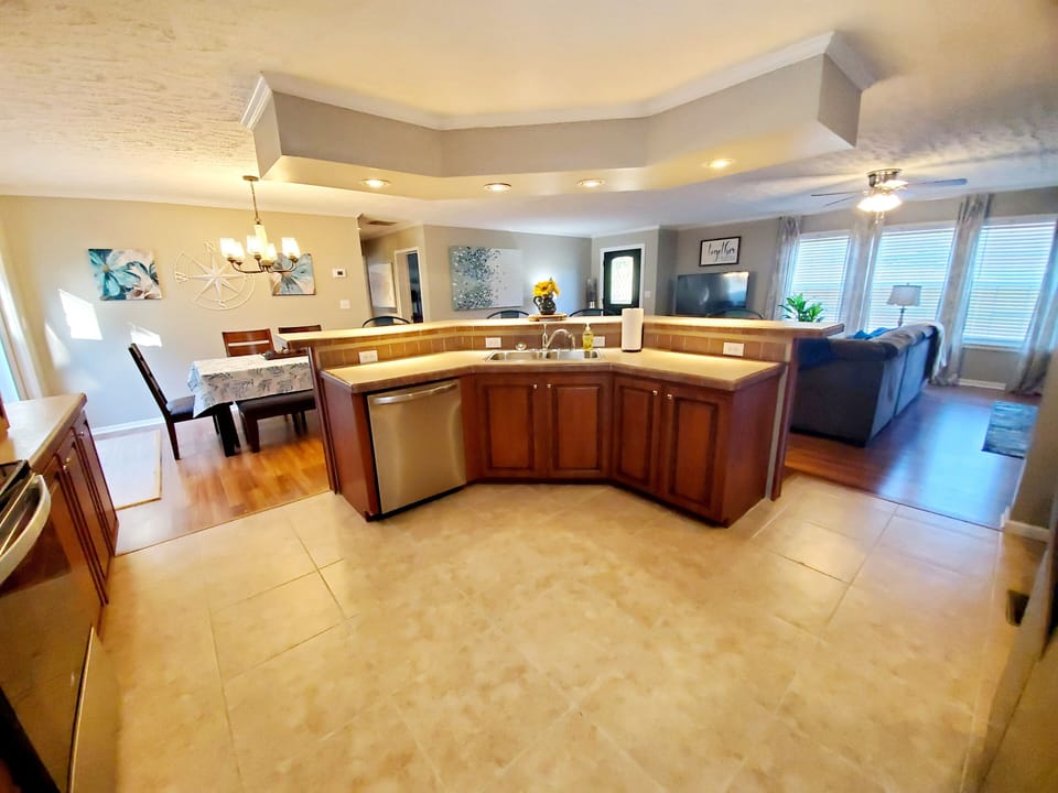 Open concept kitchen, dining, living, and game room!