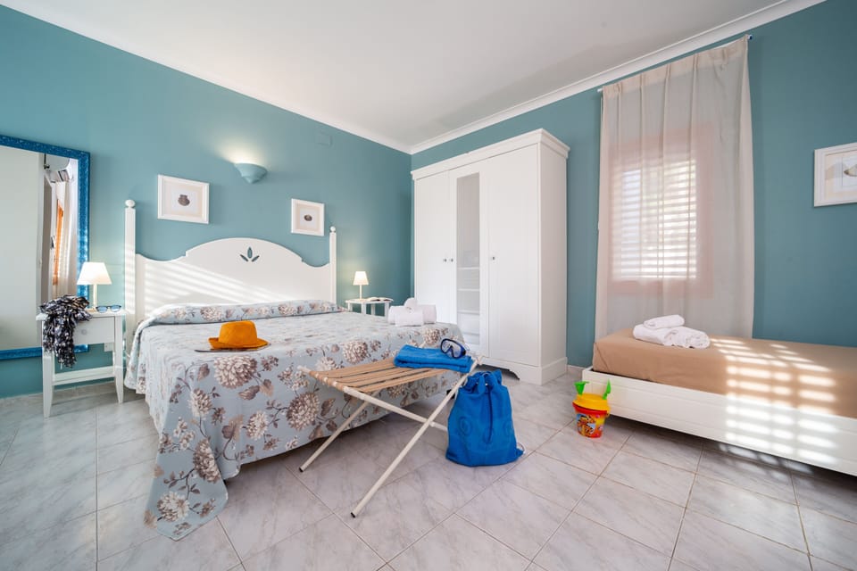 Quadruple Room | Minibar, in-room safe, desk, cribs/infant beds