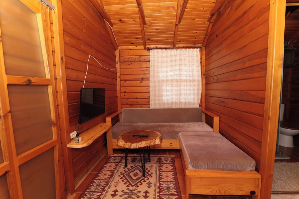 Family Bungalow | Living area | 42-inch TV with satellite channels