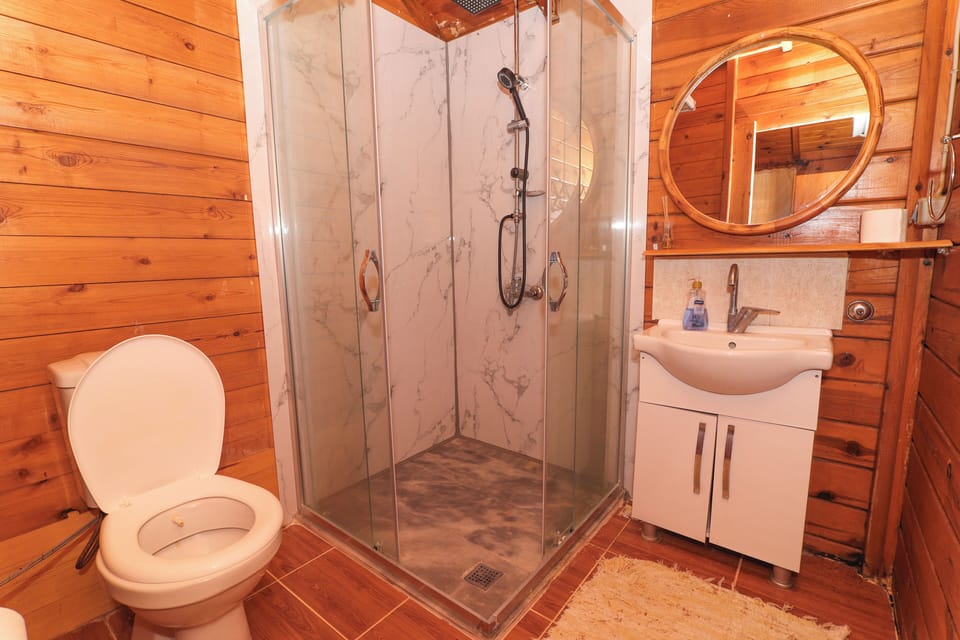 Deluxe Bungalow, 1 Bedroom, Non Smoking, Sea View | Bathroom | Shower, bathrobes, towels