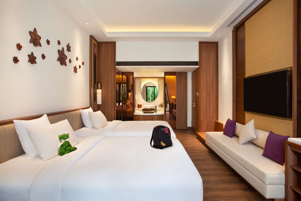 Family Room, 2 Double Beds | In-room safe, desk, blackout drapes, iron/ironing board