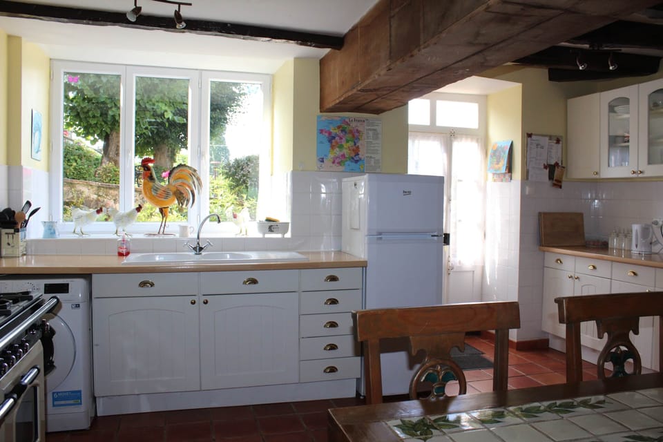 The kitchen looks out on to the pretty garden