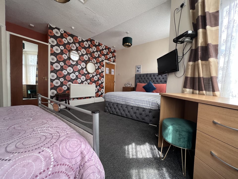 Basic Quadruple Room | Free WiFi, bed sheets