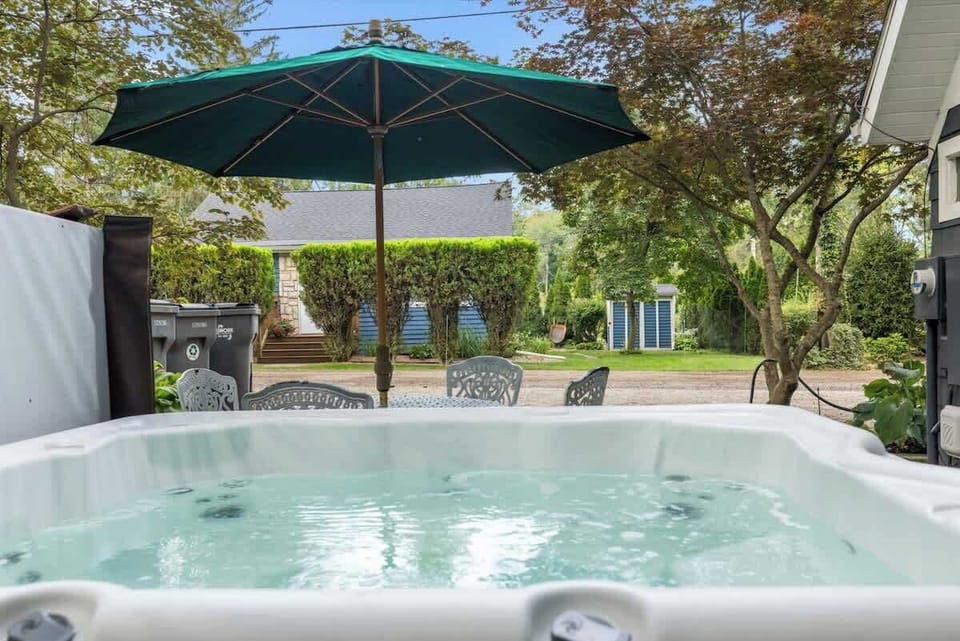 Soak beneath the shade—your private spa awaits.