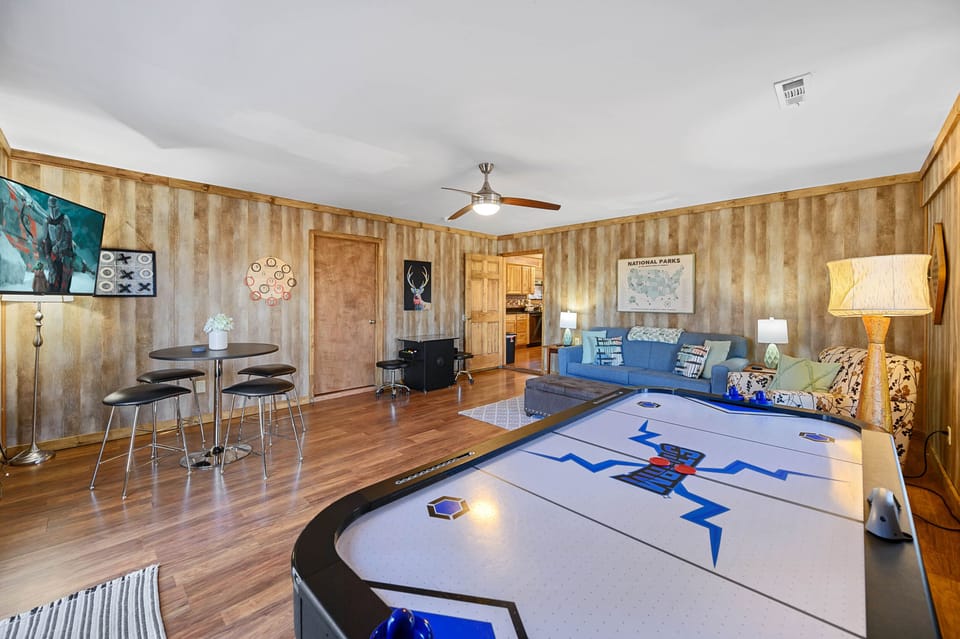 Large game room with door that closes for noise control or privacy.