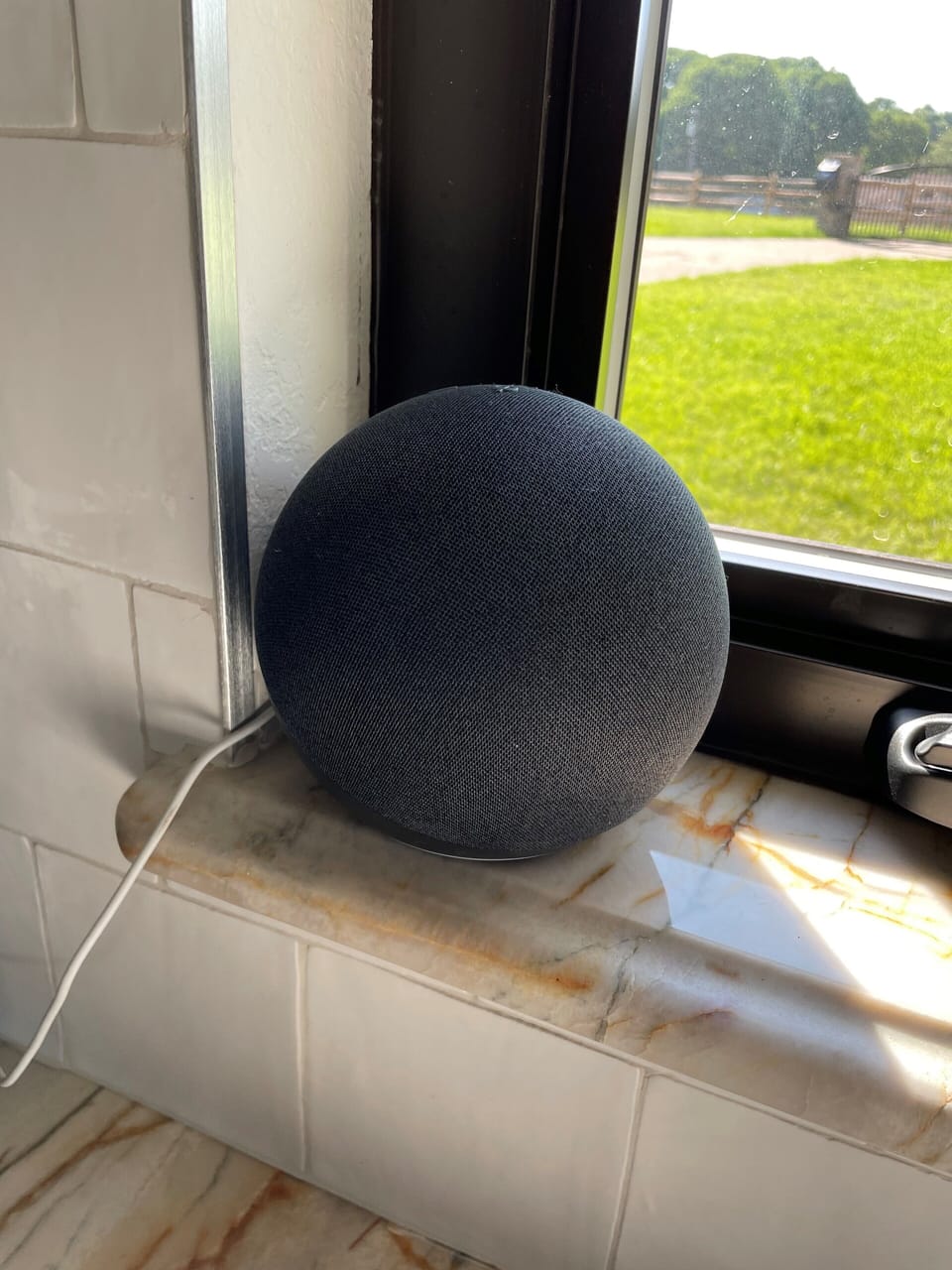 Alexa device in kitchen.