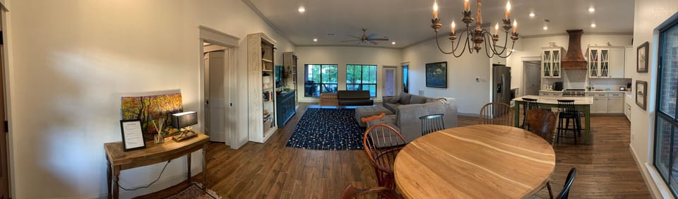 Panoramic view of dinning, living and kitchen.