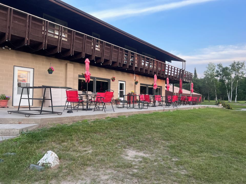 The deck wraps around to overlooks the golf course. Relax on the deck or patio