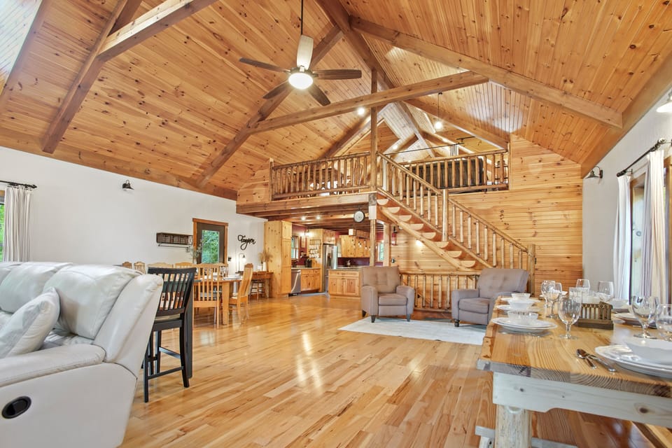 The living room/dining room is both spacious and cozy for meals, games, and gathering together with the family!