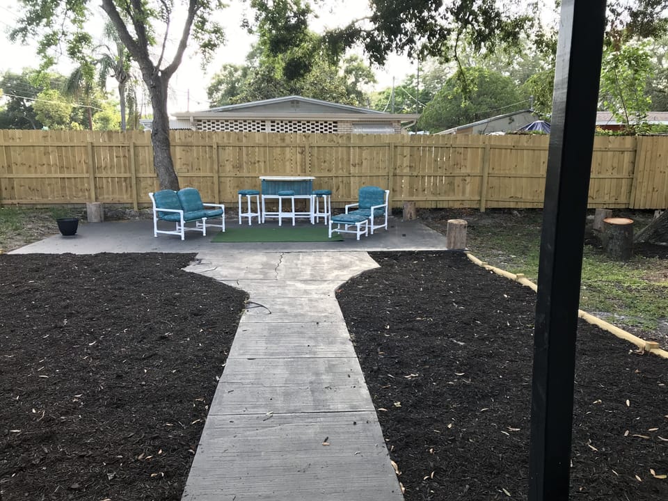 Private fully fenced backyard 