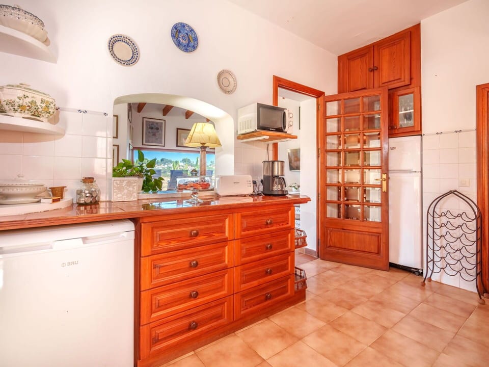 Cabinetry, Furniture, Property, Countertop, Drawer, Wood, Interior Design, Floor, Wood Stain, Flooring