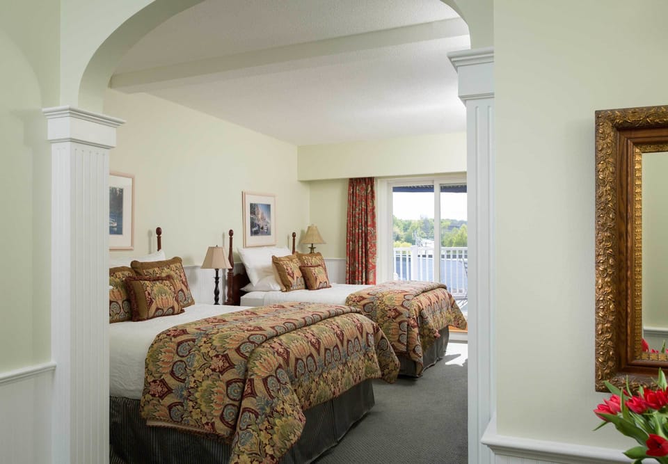 Hypo-allergenic bedding, pillowtop beds, desk, blackout drapes