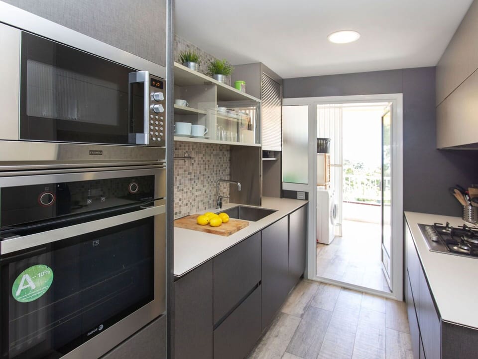 Countertop, Cabinetry, Furniture, Kitchen Appliance, Kitchen Stove, Sink, Kitchen, Home Appliance, Interior Design, Flooring