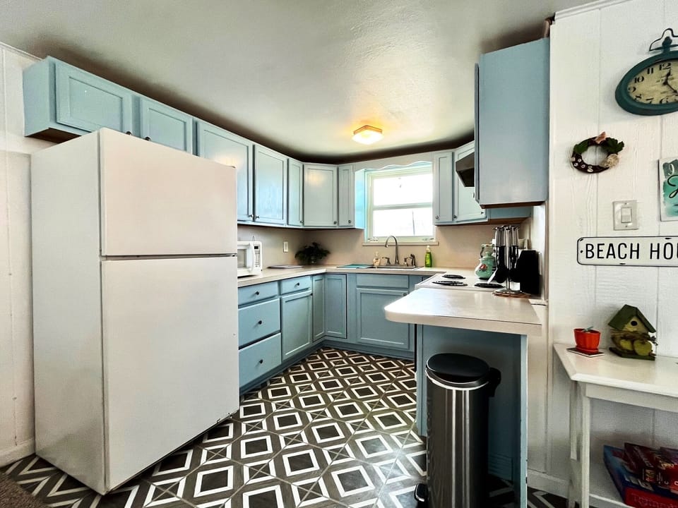 Fully stocked kitchen upstairs 