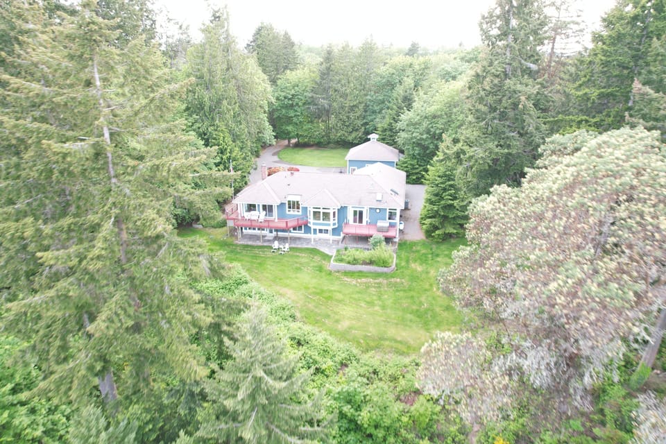 Lower level private access and full yard in private paradise