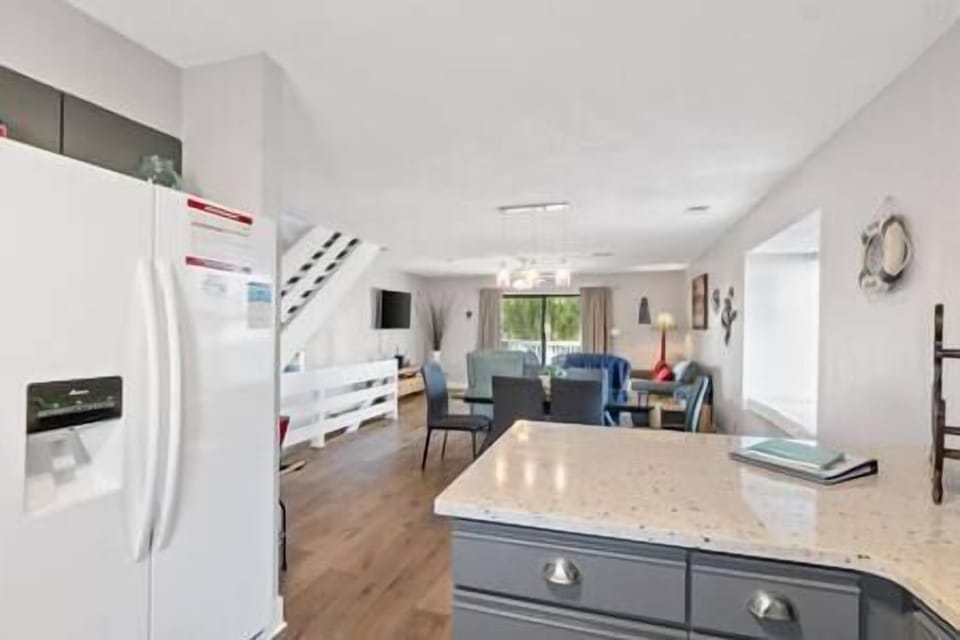 View from kitchen into dining/living room areas. 