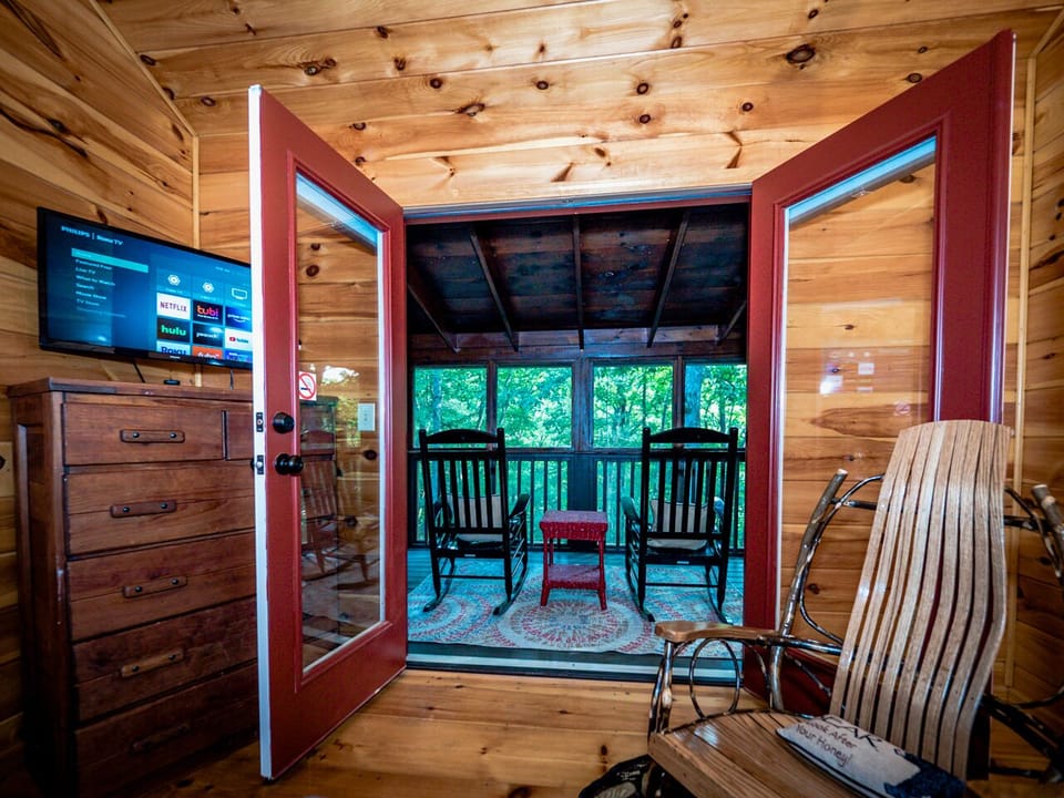The loft bedroom deck feels like you're sitting in the tree tops.