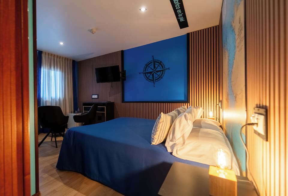 City Double Room | Minibar, individually decorated, individually furnished, desk