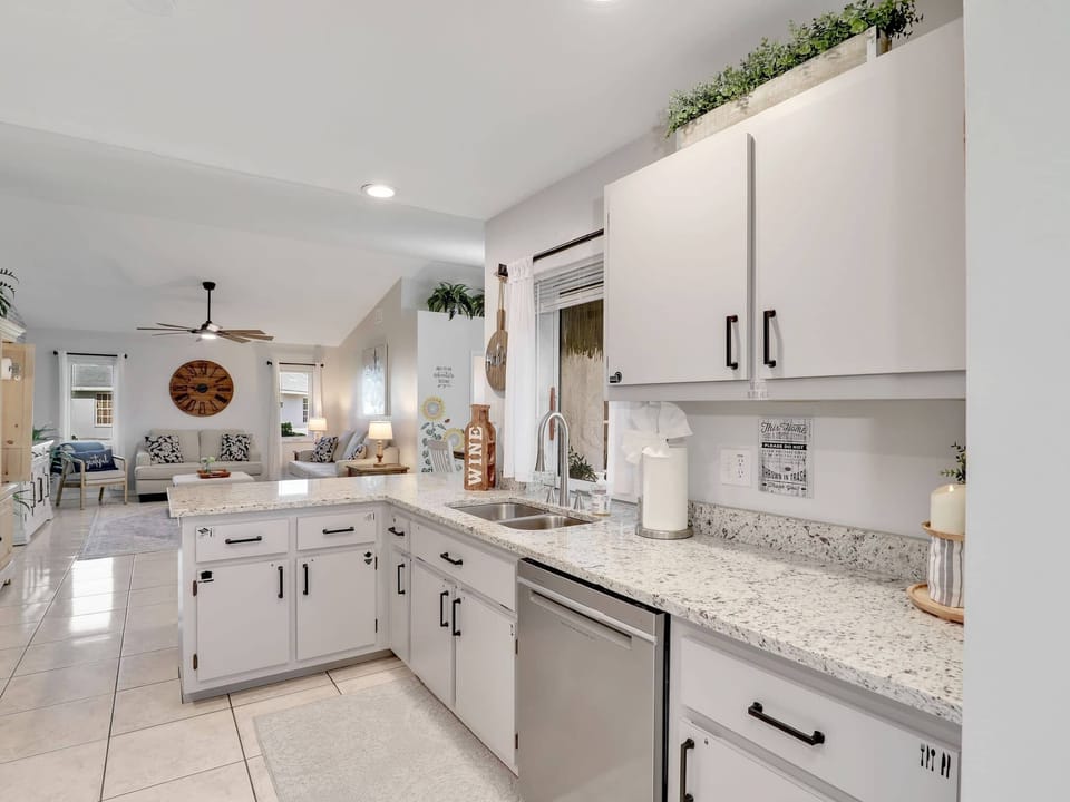 The best seat in the house is wherever the conversation is. Our open-concept kitchen looks right into the Great Room, so you never have to miss a moment of the fun. 