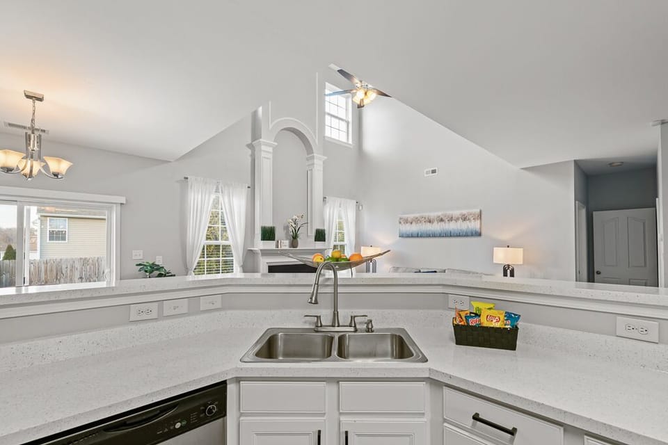 Spacious Open Concept Living Room and Fully Stocked Kitchen 
