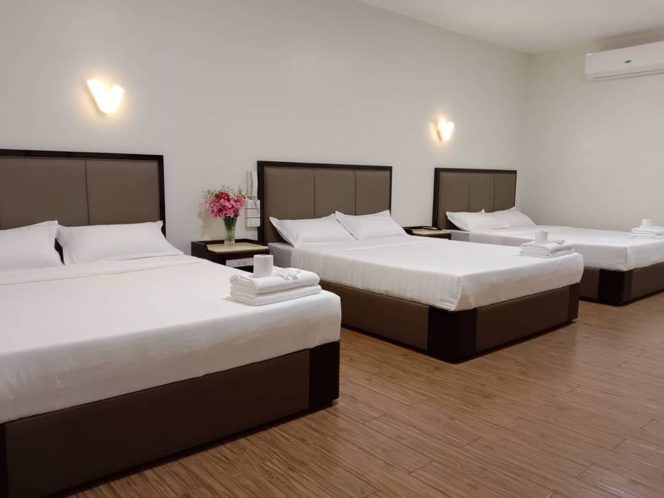 Family Triple Room | Desk, laptop workspace, free WiFi, bed sheets