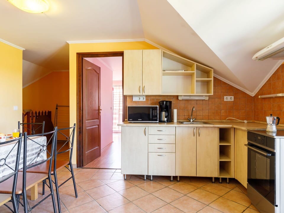 Cabinetry, Furniture, Countertop, Kitchen, Drawer, Wood, Building, Interior Design, Architecture, Flooring