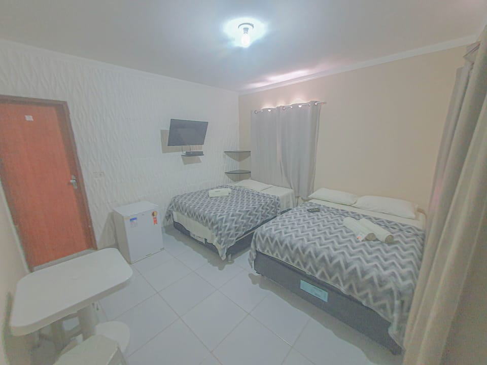 Family Suite | Living area | 32-inch Smart TV with cable channels, TV
