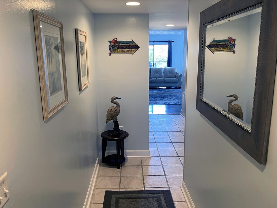 As you enter: the main living space in front and 2 bedrooms to the right. 