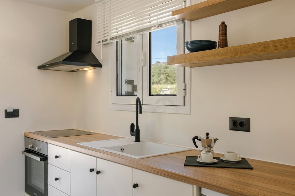 Family Quadruple Room, Multiple Beds, Terrace, Sea View | Private kitchen | Fridge, electric kettle, eco-friendly cleaning products, freezer