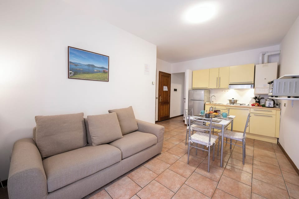 Standard Apartment, Multiple Bedrooms, Beachside (Casa Dolce Casa Stresa 50m from lake) | Living area | Flat-screen TV