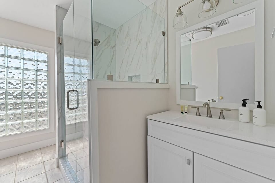 Remodeled bathroom attached to primary bedroom