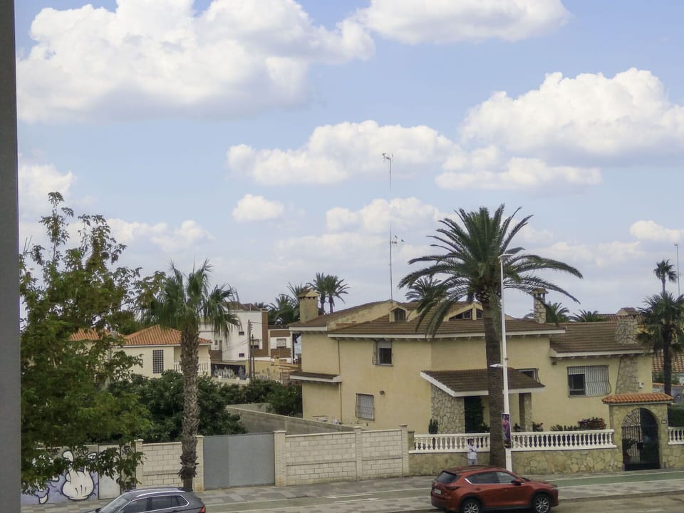 Cloud, Sky, Plant, Wheel, Building, Car, Window, Vehicle, Tree