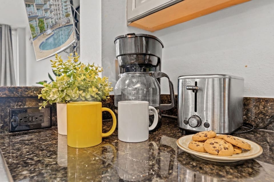 Deluxe Room, 2 Bedrooms, Balcony, Ocean View (402) | Private kitchen | Full-size fridge, microwave, stovetop, dishwasher