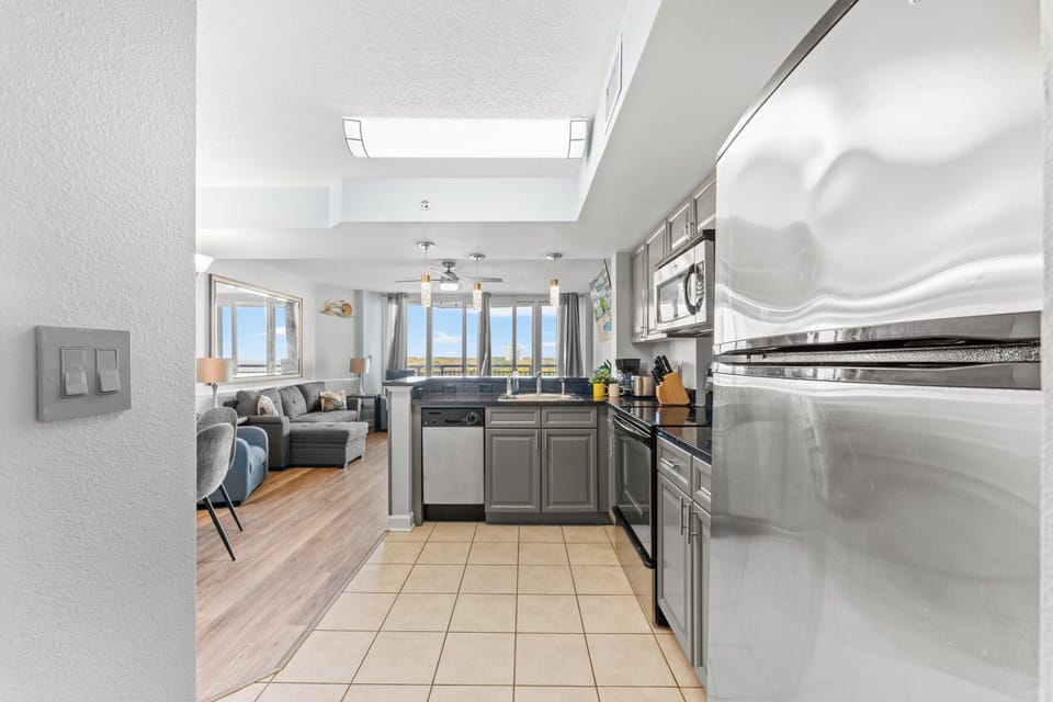 Deluxe Room, 2 Bedrooms, Balcony, Ocean View (402) | Private kitchen | Full-size fridge, microwave, stovetop, dishwasher