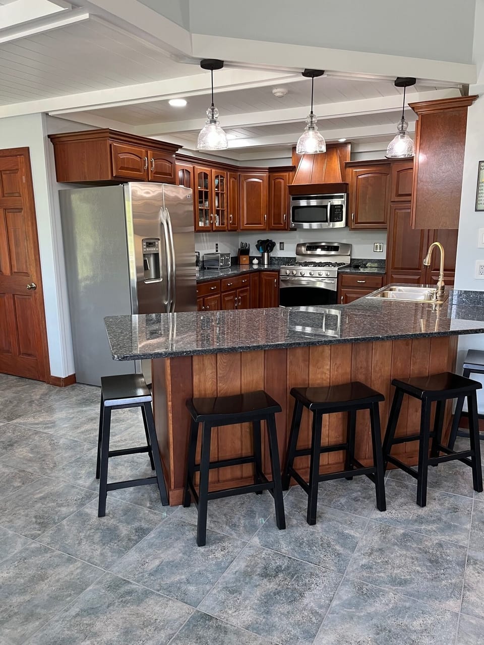 Kitchen with stainless steel appliances.

