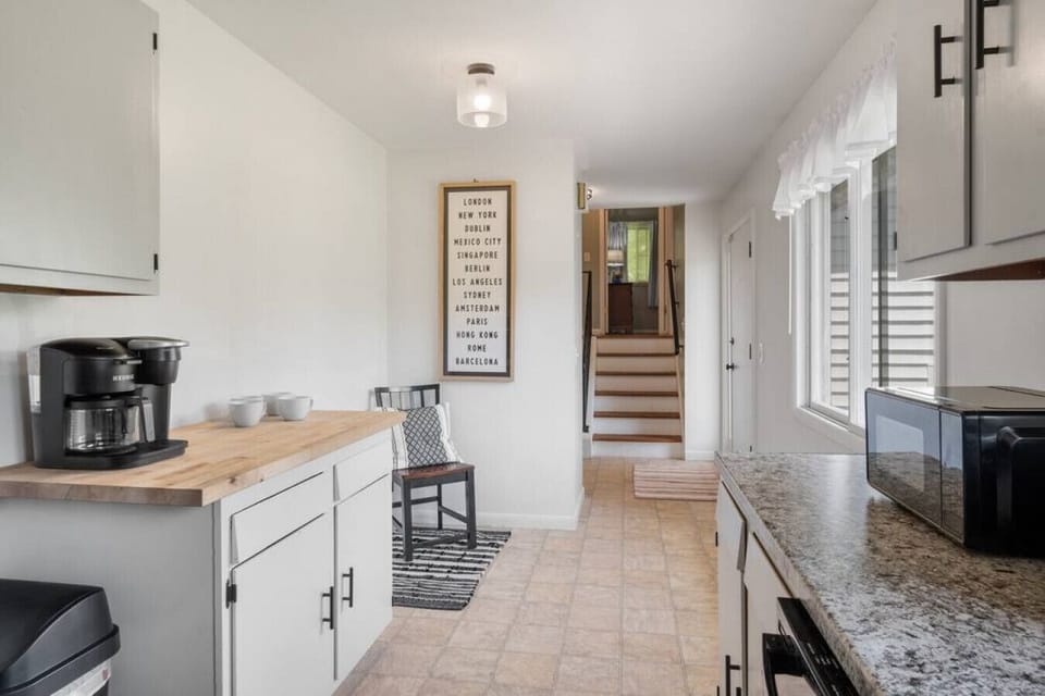 View of staircase from kitchen