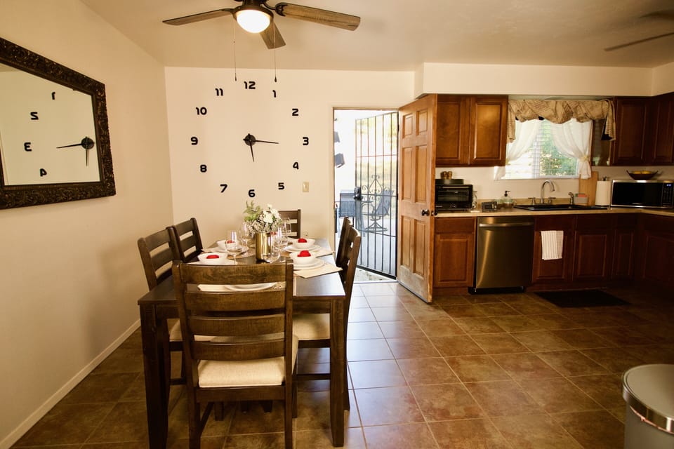 Dining room/kitchen lead out to the patio with BBQ backyard fun!