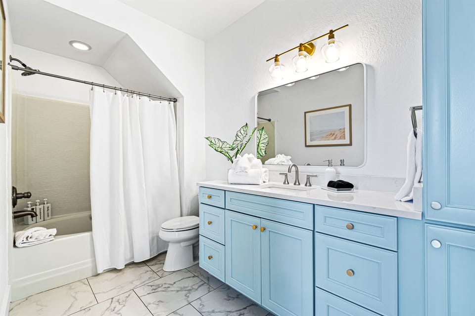Get ready to kick back and relax in a luxurious first-floor master bathroom with both tub AND shower amenities! Enjoy unwinding after your day while surrounded by opulent luxury.