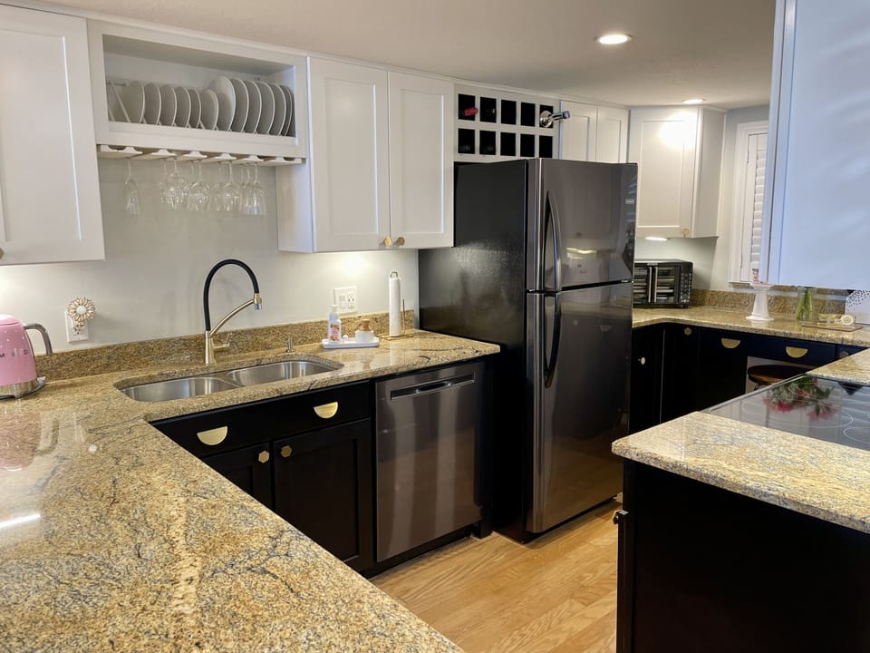 Dishwasher, range, microwave and wine storage