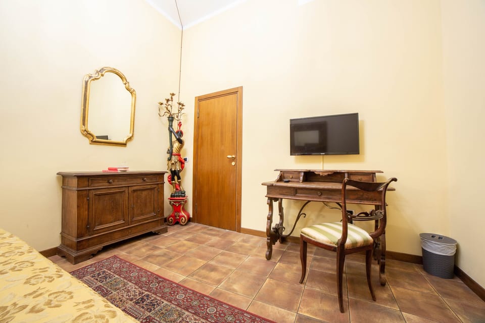 Classic Double or Twin Room | Living area | 22-inch flat-screen TV with satellite channels, TV