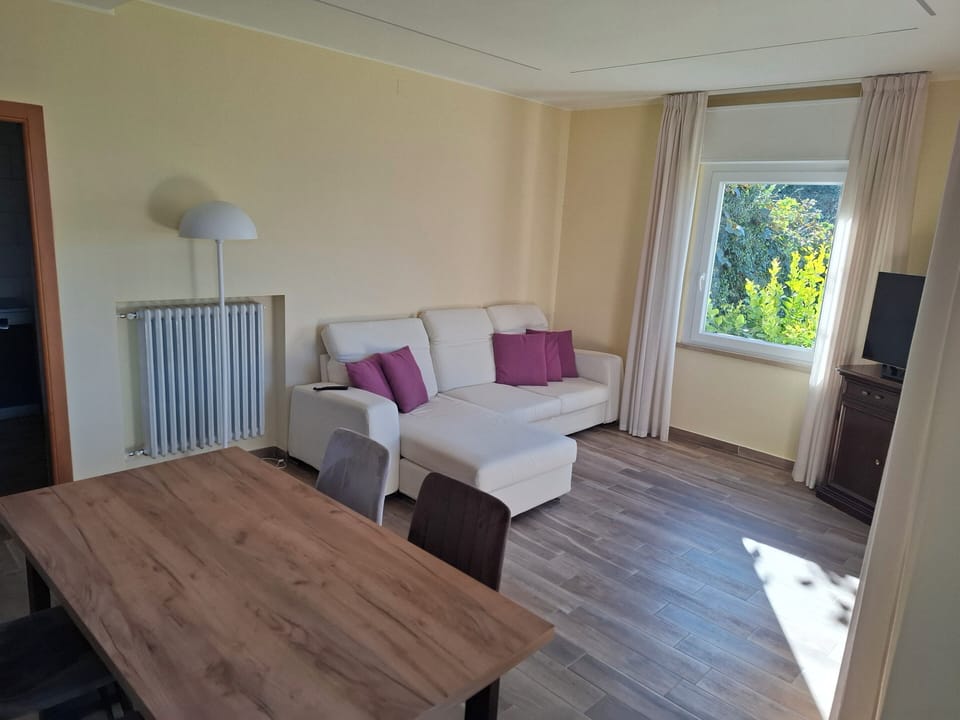 Family Apartment, 2 Bedrooms (B) | Living room | 32-inch flat-screen TV with satellite channels, TV